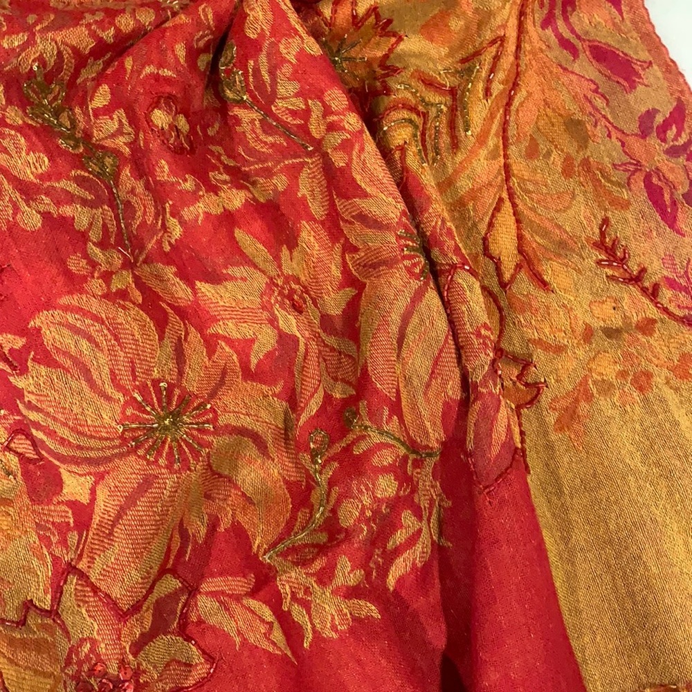 Beautiful wool beaded scarf/wrap made in Italy. Main color is red.